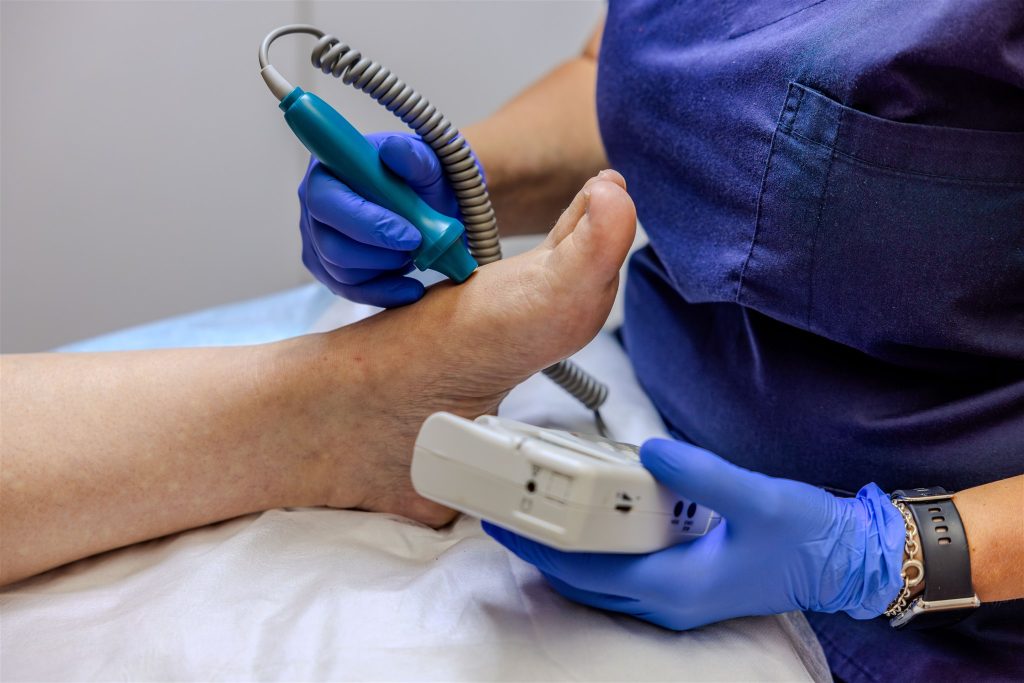 Andy Blecher performing a vascular ultrasound examination